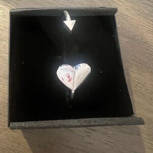 New Without tag . Kate spade bangle one end has a heart and the other an arrow